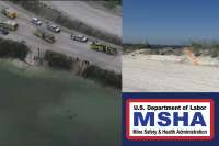 Mine truck driver dies after crossing berm into water-filled pit